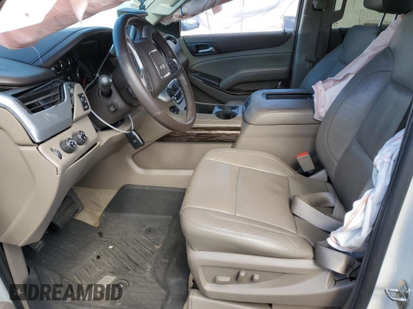 2015 GMC Yukon SLT with VIN 1GKS2BKC3FR143491, listed as a Copart auction lot 76062044 with Not Provided miles and Salvage Title. Bid and sale history available at DreamBid. Image 7.