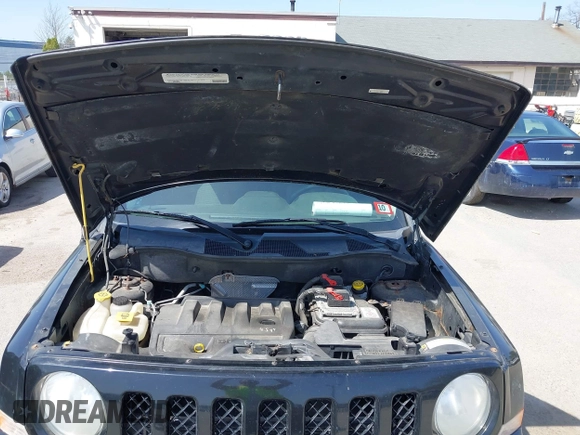 2012 Jeep Patriot Sport with VIN 1C4NJRBB3CD599477, listed as a IAAI auction lot 42147528 with 144,269 mi miles. Bid and sale history available at carsss.com. Image 10.