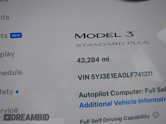 2020 Tesla Model 3 Standard Range Plus with VIN 5YJ3E1EA0LF741311, listed as a IAAI auction lot 41581931 with 43,284 mi miles. Bid and sale history available at carsss.com. Image 15.