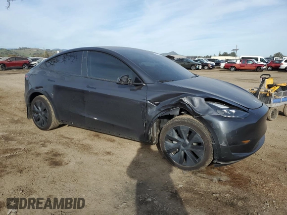 2024 Tesla Model Y with VIN 7SAYGDED5RF105278, listed as a Copart auction lot 44376125 with 12,693 mi miles and Salvage Title. Bid and sale history available at DreamBid. Image 4.