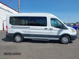 2015 Ford Transit Passenger XL z VIN 1FBAX2CG7FKA75719, wystawiony jako IAAI lot #42135118 z przebiegiem Nie podano mil oraz . Historia ofert i sprzedaży dostępna na DreamBid. Obrazek 13.