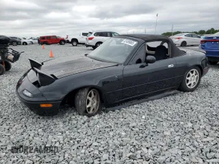 1994 Mazda MX-5 Miata with VIN JM1NA3534R0513305, listed as a Copart auction lot 52489865 with 150,481 mi miles and Salvage title. Bid and sale history available at DreamBid. Image 1.