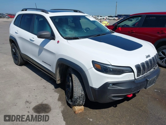 2021 Jeep Cherokee Trailhawk with VIN 1C4PJMBX1MD145169, listed as a IAAI auction lot 42340464 with 50,925 mi miles and . Bid and sale history available at DreamBid. Image 1.