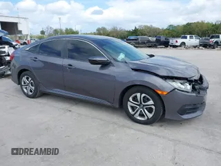 2018 Honda Civic Sedan LX with VIN 19XFC2F59JE044099, listed as a IAAI auction lot 41719337 with 44,534 mi miles. Bid and sale history available at carsss.com. Image 1.