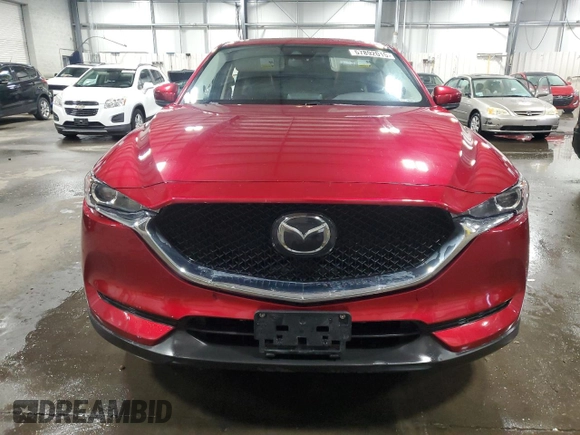 2018 Mazda CX-5 Touring z VIN JM3KFBCM5J0462676, wystawiony jako Copart lot #57892015 z przebiegiem 76 566 mil mil oraz Szkoda całkowita • Salvage title. Historia ofert i sprzedaży dostępna na DreamBid. Obrazek 5.