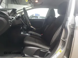 2013 Ford Fiesta SE z VIN 3FADP4BJ8DM220456, wystawiony jako Copart lot #58596825 z przebiegiem 115 933 mil mil oraz Szkoda całkowita • Salvage title. Historia ofert i sprzedaży dostępna na DreamBid. Obrazek 7.