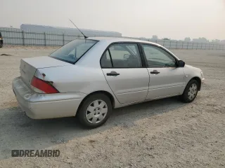 2002 Mitsubishi Lancer ES with VIN JA3AJ26E22U045919, listed as a Copart auction lot 63852225 with 184,071 mi miles and Salvage title. Bid and sale history available at DreamBid. Image 3.
