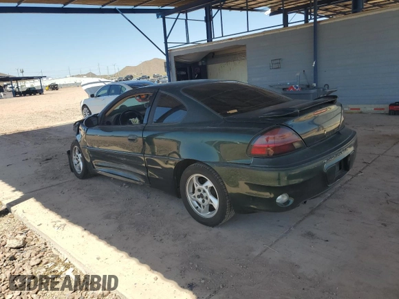 2003 Pontiac Grand Am GT z VIN 1G2NW12E73C151041, wystawiony jako Copart lot #58393835 z przebiegiem 106 052 mil mil oraz Szkoda całkowita • Salvage title. Historia ofert i sprzedaży dostępna na DreamBid. Obrazek 2.