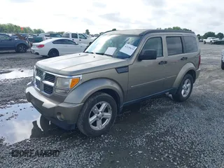 2007 Dodge Nitro SLT z VIN 1D8GT58KX7W689384, wystawiony jako IAAI lot #42139632 z przebiegiem 242 166 mil mil oraz . Historia ofert i sprzedaży dostępna na DreamBid. Obrazek 17.