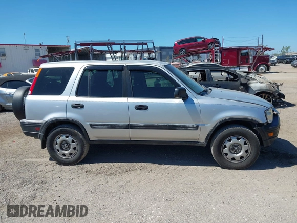 2000 Honda CR-V LX with VIN JHLRD2846YC009880, listed as a IAAI auction lot 41830061 with 263,177 mi miles. Bid and sale history available at carsss.com. Image 12.