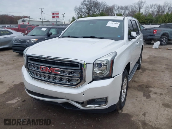 2016 GMC Yukon SLT with VIN 1GKS2BKC5GR374815, listed as a IAAI auction lot 41889495 with 163,464 mi miles. Bid and sale history available at carsss.com. Image 18.