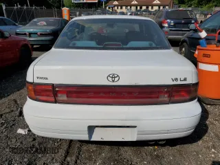 1992 Toyota Camry z VIN 4T1VK12E0NU015172, wystawiony jako Copart lot #58974095 z przebiegiem 210 163 mil mil oraz Szkoda całkowita • Salvage title. Historia ofert i sprzedaży dostępna na DreamBid. Obrazek 6.
