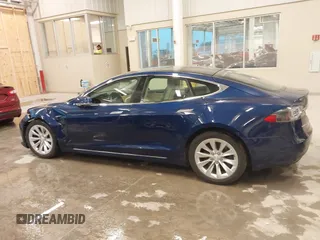 2018 Tesla Model S 75D with VIN 5YJSA1E24JF276044, listed as a IAAI auction lot 41798530 with 53,462 mi miles and . Bid and sale history available at DreamBid. Image 14.