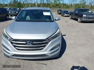 2016 Hyundai Tucson Sport with VIN KM8J33A25GU224084, listed as a IAAI auction lot 41827851 with 153,348 mi miles. Bid and sale history available at carsss.com. Image 12.