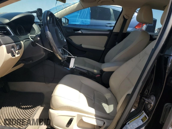 2014 Volkswagen Jetta TDI w/Premium with VIN 3VWLL7AJ8EM402757, listed as a Copart auction lot 52201895 with 99,475 mi miles and Salvage title. Bid and sale history available at DreamBid. Image 7.