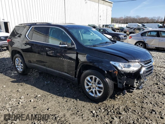 2021 Chevrolet Traverse LT Leather with VIN 1GNEVHKW3MJ196014, listed as a Copart auction lot 49678595 with 124,695 mi miles and Salvage Title. Bid and sale history available at carsss.com. Image 4.