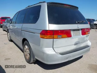 2002 Honda Odyssey EX-L z VIN 5FNRL18062B011890, wystawiony jako IAAI lot #41972294 z przebiegiem 245 889 mil mil oraz . Historia ofert i sprzedaży dostępna na DreamBid. Obrazek 3.