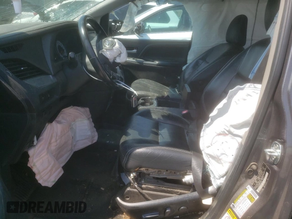 2016 Toyota Sienna SE with VIN 5TDXK3DC9GS724520, listed as a Copart auction lot 51005185 with 88,074 mi miles and Salvage title. Bid and sale history available at DreamBid. Image 7.