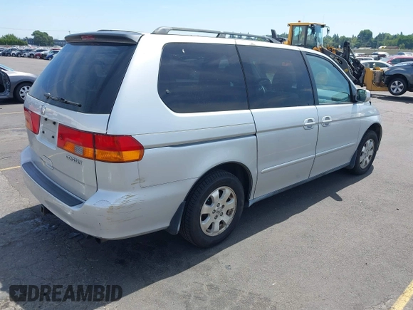2003 Honda Odyssey EX-L with VIN 5FNRL18993B098670, listed as a IAAI auction lot 42781006 with 222,584 mi miles and . Bid and sale history available at DreamBid. Image 4.