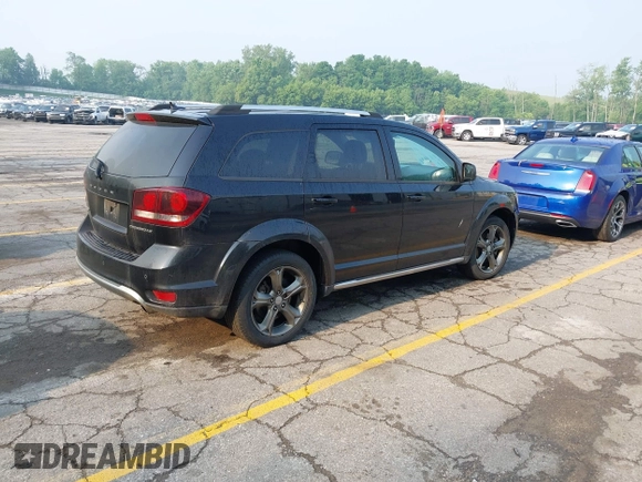 2015 Dodge Journey Crossroad with VIN 3C4PDDGG6FT740760, listed as a IAAI auction lot 42428742 with 215,219 mi miles and . Bid and sale history available at DreamBid. Image 4.