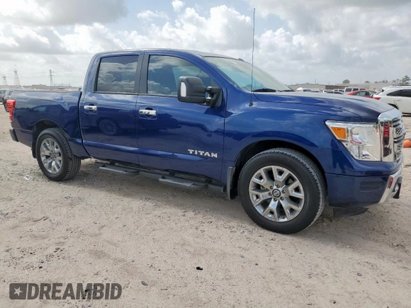 2021 Nissan Titan SV with VIN 1N6AA1EF0MN512559, listed as a Copart auction lot 61561305 with 31,344 mi miles and Salvage title. Bid and sale history available at DreamBid. Image 4.