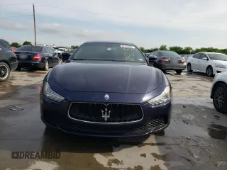 2015 Maserati Ghibli with VIN ZAM57XSA6F1146076, listed as a Copart auction lot 52474303 with 82,575 mi miles. Bid and sale history available at carsss.com. Image 5.