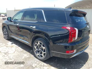 2021 Hyundai Palisade Calligraphy z VIN KM8R7DHE8MU278889, wystawiony jako IAAI lot #42284376 z przebiegiem 88 383 mil mil oraz . Historia ofert i sprzedaży dostępna na DreamBid. Obrazek 3.