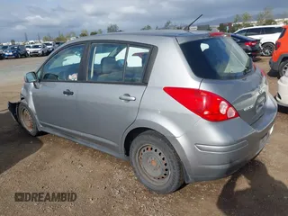 2012 Nissan Versa S with VIN 3N1BC1CPXCK229848, listed as a IAAI auction lot 41955230 with 194,702 mi miles. Bid and sale history available at carsss.com. Image 3.
