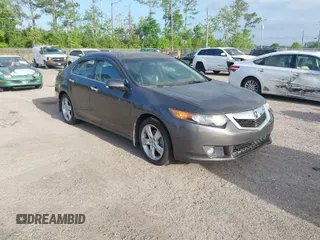 2009 Acura TSX with VIN JH4CU26649C028998, listed as a IAAI auction lot 42014953 with 191,712 mi miles. Bid and sale history available at carsss.com. Image 1.