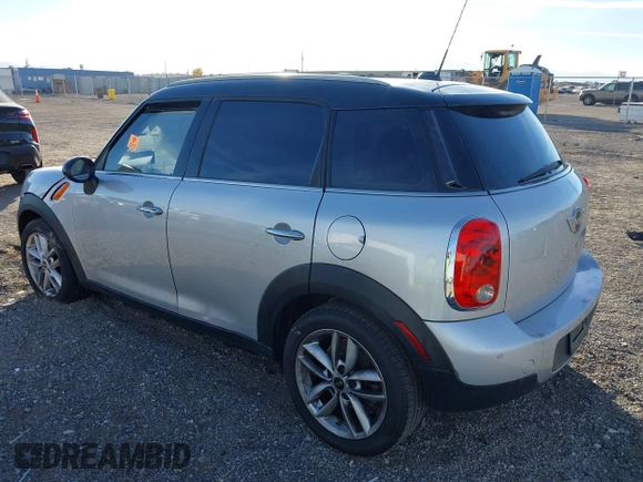 2012 MINI Countryman with VIN WMWZB3C59CWM05749, listed as a IAAI auction lot 38329304 with 64,590 mi miles and . Bid and sale history available at DreamBid. Image 3.