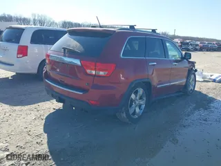 2012 Jeep Grand Cherokee Overland with VIN 1C4RJFCTXCC166770, listed as a IAAI auction lot 41833086 with 175,656 mi miles. Bid and sale history available at carsss.com. Image 4.