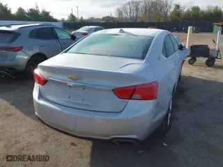 2014 Chevrolet Impala LTZ with VIN 2G1155S33E9143458, listed as a IAAI auction lot 41865302 with 75,554 mi miles. Bid and sale history available at carsss.com. Image 4.
