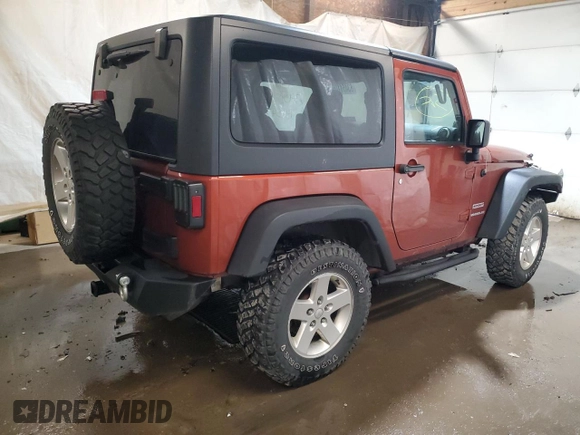 2014 Jeep Wrangler Sport with VIN 1C4AJWAG7EL197285, listed as a Copart auction lot 63451105 with 141,547 mi miles and Salvage title. Bid and sale history available at DreamBid. Image 3.