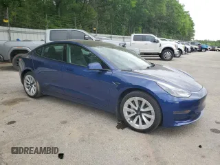 2023 Tesla Model 3 with VIN 5YJ3E1EA5PF695318, listed as a Copart auction lot 53832935 with 28,863 mi miles and Salvage title. Bid and sale history available at DreamBid. Image 4.