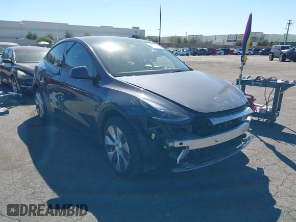 2023 Tesla Model Y Long Range with VIN 7SAYGAEE8PF976969, listed as a IAAI auction lot 41877784 with 25,896 mi miles. Bid and sale history available at carsss.com. Image 14.