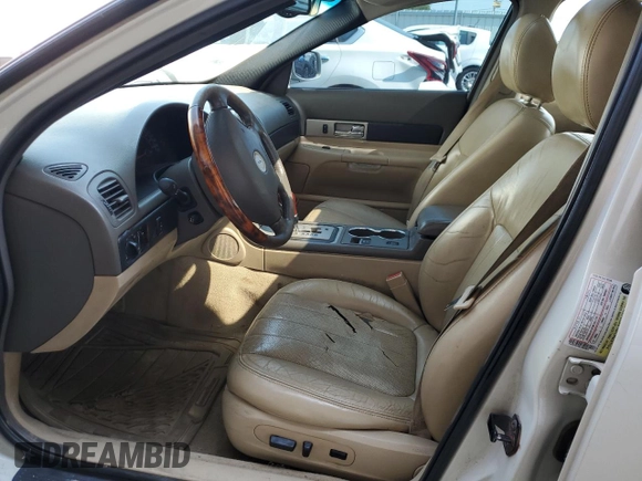 2005 Lincoln LS Sport z VIN 1LNHM87A05Y646745, wystawiony jako Copart lot #70427194 z przebiegiem Nie podano mil oraz Szkoda całkowita • Salvage title. Historia ofert i sprzedaży dostępna na DreamBid. Obrazek 7.