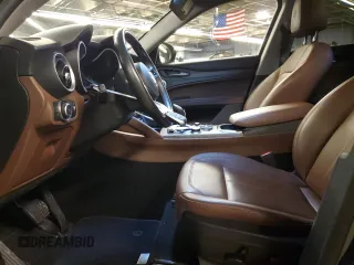 2020 Alfa Romeo Stelvio Ti z VIN ZASPAKBN5L7C92294, wystawiony jako Copart lot #85327554 z przebiegiem 30 633 mil mil oraz Szkoda całkowita • Salvage title. Historia ofert i sprzedaży dostępna na DreamBid. Obrazek 7.