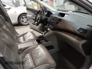 2013 Honda CR-V EX-L with VIN 2HKRM3H72DH504122, listed as a IAAI auction lot 41647580 with 217,451 mi miles and . Bid and sale history available at DreamBid. Image 5.