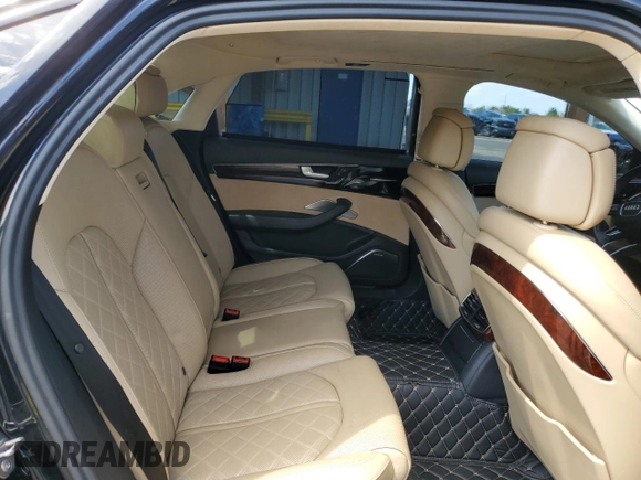 2014 Audi A8 4.0T с VIN WAUR2AFD7EN005348, выставлен на аукционе Copart как лот 58156975 с пробегом 102 754 миль миль и Списание • Salvage title. История ставок и продаж доступна на DreamBid. Изображение 10.