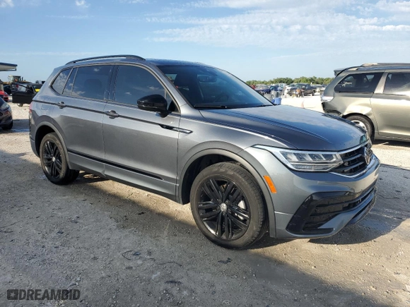 2022 Volkswagen Tiguan SE R-Line Black with VIN 3VVCB7AX2NM063439, listed as a Copart auction lot 50154795 with 59,809 mi miles and Non Repairable. Bid and sale history available at carsss.com. Image 4.
