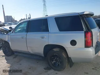 2018 Chevrolet Tahoe Commercial with VIN 1GNSKDEC1JR340887, listed as a IAAI auction lot 41044038 with 99,500 mi miles. Bid and sale history available at carsss.com. Image 14.
