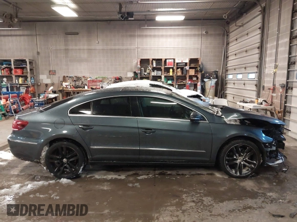 2013 Volkswagen CC Lux with VIN WVWRP7AN5DE540510, listed as a IAAI auction lot 41571739 with 129,295 mi miles. Bid and sale history available at carsss.com. Image 14.