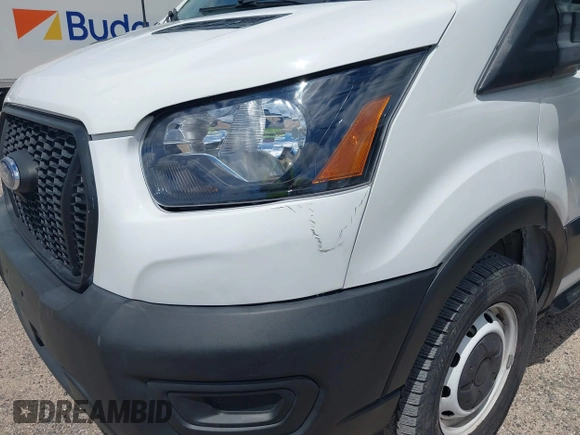 2022 Ford Transit Cargo with VIN 1FTBR3X89NKA23915, listed as a IAAI auction lot 42233534 with 3,755 mi miles and . Bid and sale history available at DreamBid. Image 6.