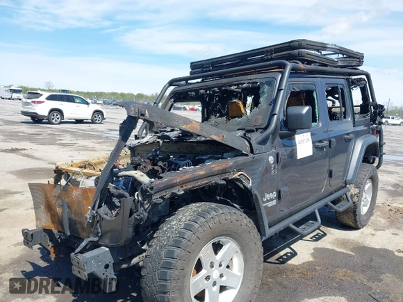 2020 Jeep Wrangler Unlimited Sport S z VIN 1C4HJXDNXLW226806, wystawiony jako IAAI lot #41857458 z przebiegiem Nie podano mil oraz . Historia ofert i sprzedaży dostępna na DreamBid. Obrazek 2.