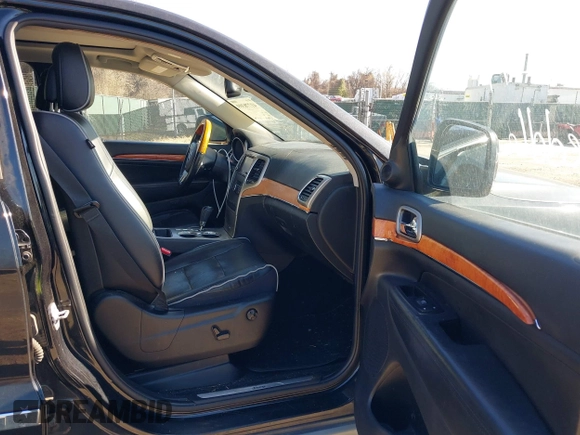 2011 Jeep Grand Cherokee Overland with VIN 1J4RS6GGXBC659349, listed as a IAAI auction lot 41778399 with 219,624 mi miles and . Bid and sale history available at DreamBid. Image 5.