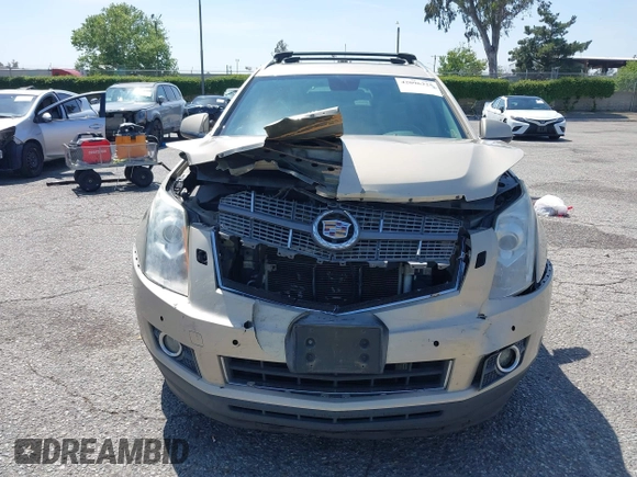 2011 Cadillac SRX Premium Collection z VIN 3GYFNCEY3BS506360, wystawiony jako IAAI lot #42096225 z przebiegiem 173 514 mil mil oraz . Historia ofert i sprzedaży dostępna na DreamBid. Obrazek 12.