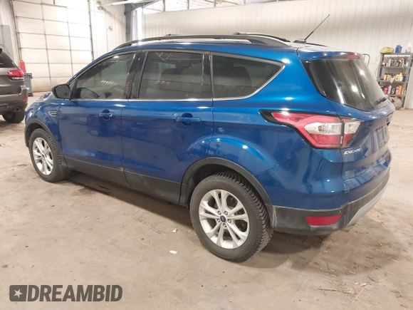 2017 Ford Escape SE z VIN 1FMCU0G90HUA94581, wystawiony jako IAAI lot #41396965 z przebiegiem 104 978 mil mil oraz . Historia ofert i sprzedaży dostępna na DreamBid. Obrazek 3.
