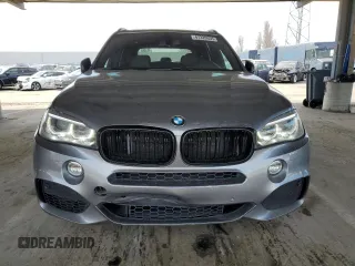 2014 BMW X5 xDrive50i z VIN 5UXKR6C58E0C03414, wystawiony jako Copart lot #47437935 z przebiegiem 126 402 mil mil oraz Szkoda całkowita • Salvage title. Historia ofert i sprzedaży dostępna na DreamBid. Obrazek 5.