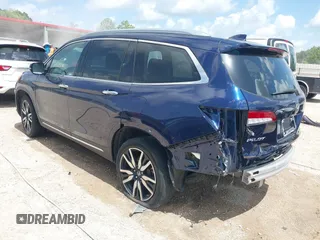 2022 Honda Pilot Touring 7-Passenger with VIN 5FNYF5H61NB019768, listed as a IAAI auction lot 42438780 with Not provided miles and . Bid and sale history available at DreamBid. Image 3.