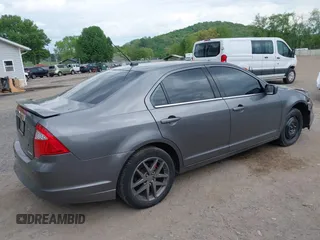 2012 Ford Fusion SEL z VIN 3FAHP0JG0CR410463, wystawiony jako IAAI lot #39357312 z przebiegiem 136 894 mil mil oraz . Historia ofert i sprzedaży dostępna na DreamBid. Obrazek 4.
